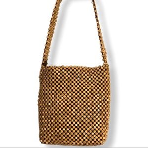 The sak wood bead purse bag with interior pocket